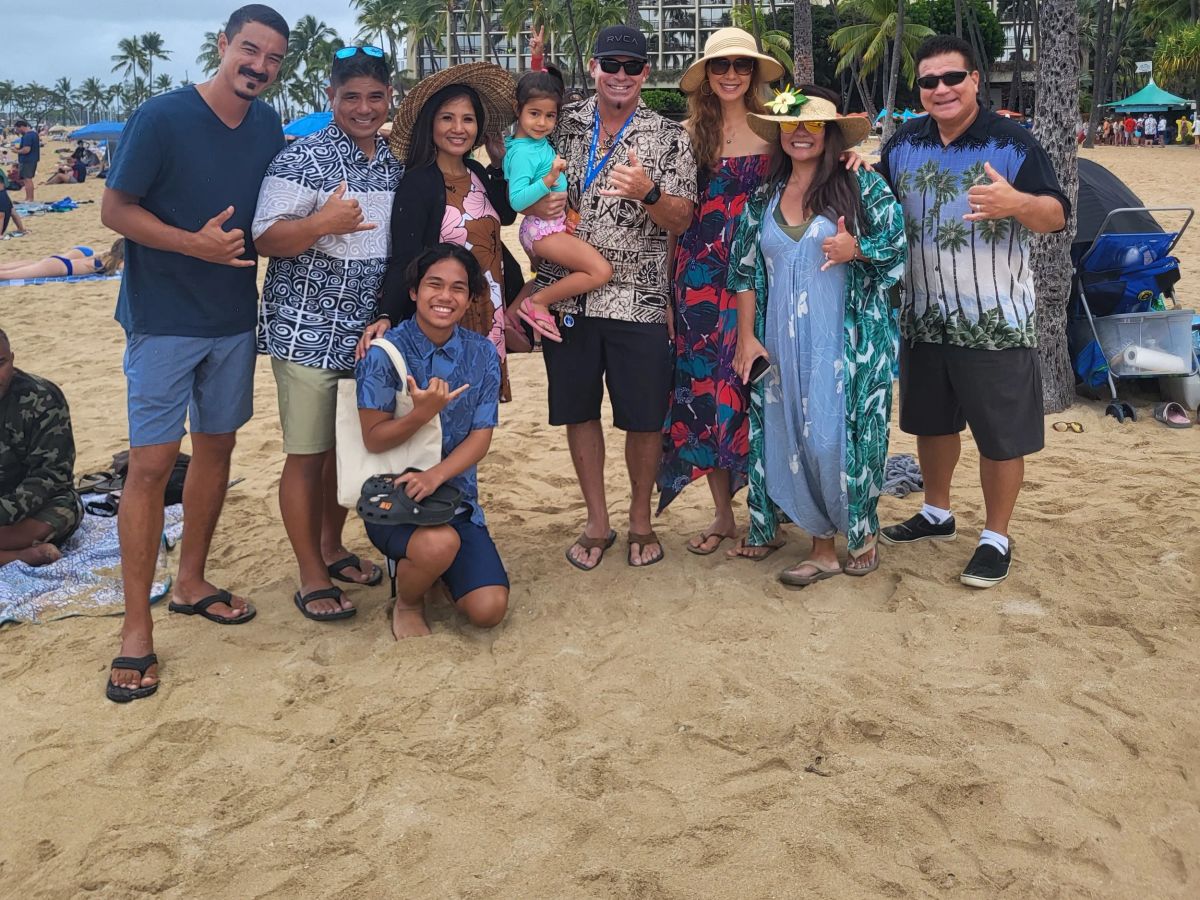 A large SFC group gathered on the beach after surfing together